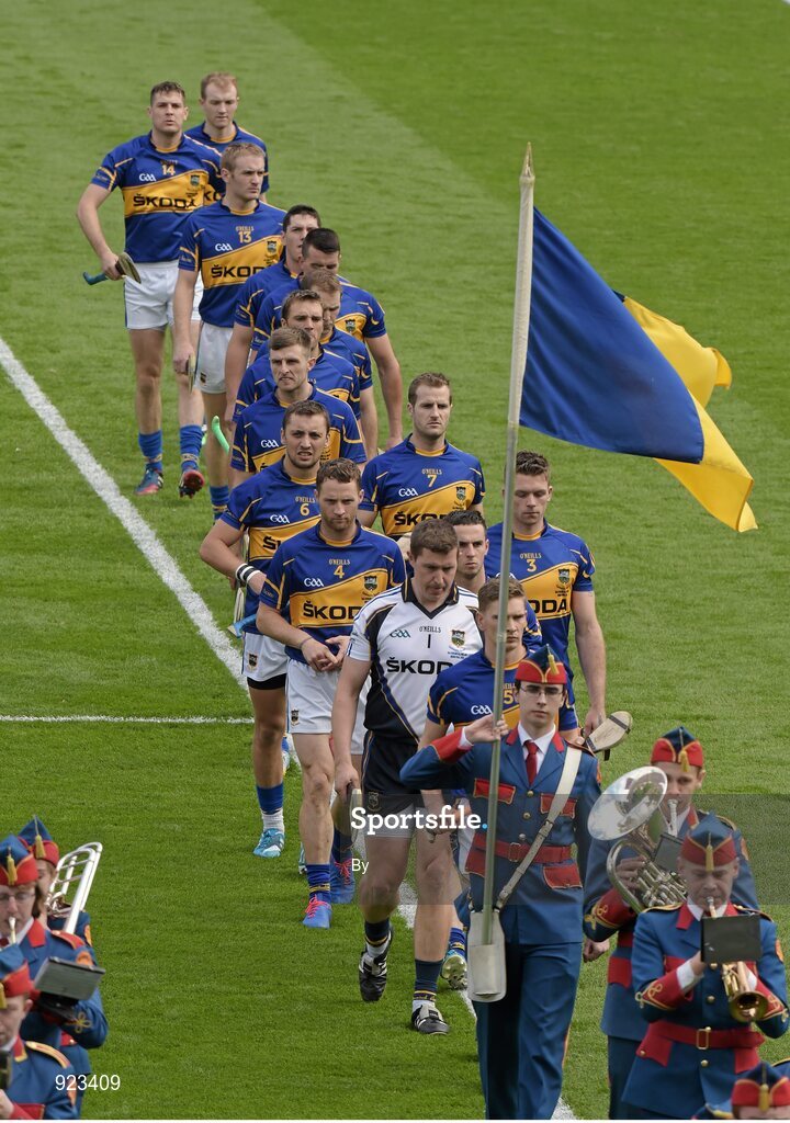 7 September 2014; The Tipperary team march behind the Artane Band during the pre-match parade. GAA Hurling All Ireland Senior Championship Final, Kilkenny v Tipperary. Croke Park, Dublin. Picture credit: Ray McManus / SPORTSFILE
