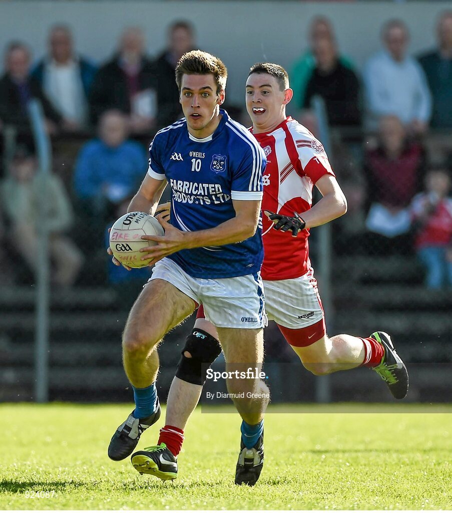 12 October 2014; Conor Ryan, Cratloe, in action against Sean Corry, Eire Og. Clare County Senior Football Championship Final, Cratloe v Eire Og. Cusack Park, Ennis, Co. Clare. Picture credit: Diarmuid Greene / SPORTSFILE