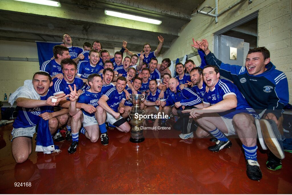 12 October 2014; Double County Champions Cratloe celebrate with their cups in the dressing room after victory over Eire Og. Clare County Senior Football Championship Final, Cratloe v Eire Og. Cusack Park, Ennis, Co. Clare. Picture credit: Diarmuid Greene / SPORTSFILE