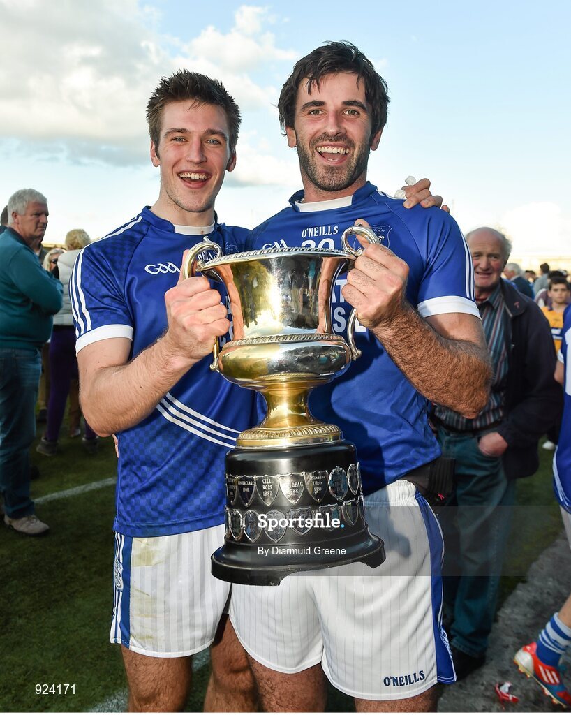 12 October 2014; Cratloe's Conor Ryan, left, and John Galvin celebrate with the cup after victory over Eire Og. Clare County Senior Football Championship Final, Cratloe v Eire Og. Cusack Park, Ennis, Co. Clare. Picture credit: Diarmuid Greene / SPORTSFILE