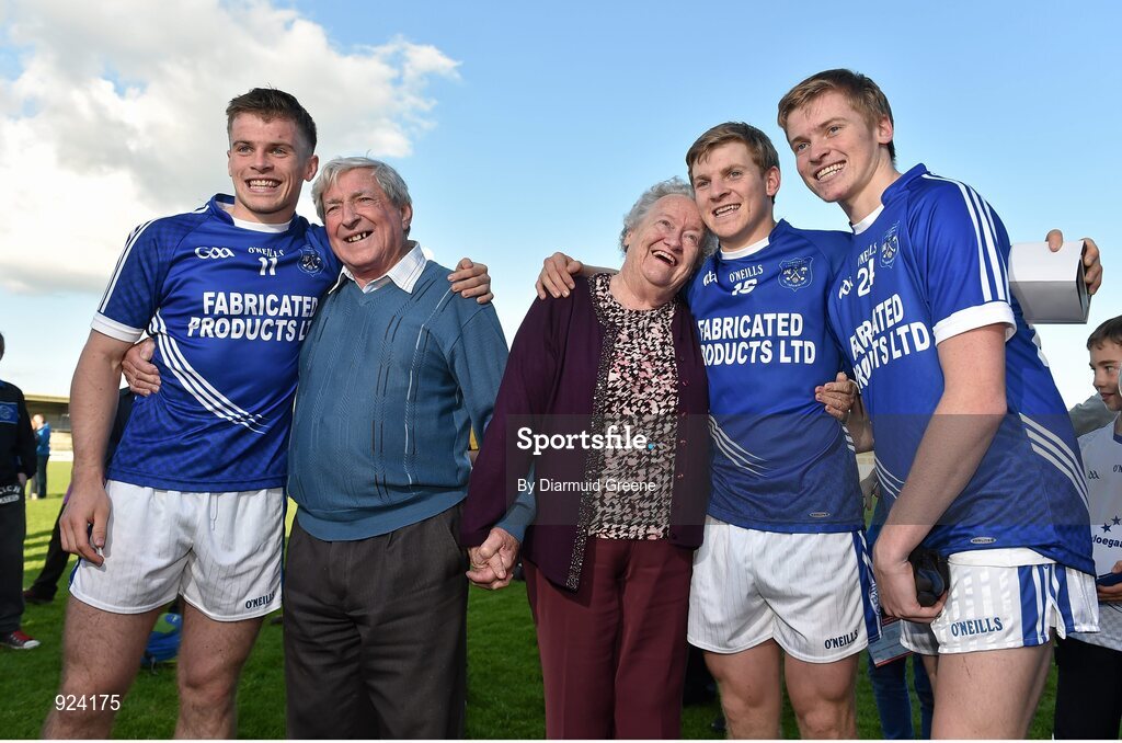 12 October 2014; Cratloe players, and brothers, from left to right, Sean Collins, Padraic Collins, and David Collins celebrate with their grandparents Annette and Cyril Collins after victory over Eire Og. Clare County Senior Football Championship Final, Cratloe v Eire Og. Cusack Park, Ennis, Co. Clare. Picture credit: Diarmuid Greene / SPORTSFILE
