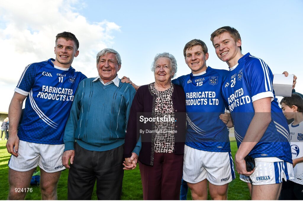 12 October 2014; Cratloe players, and brothers, from left to right, Sean Collins, Padraic Collins, and David Collins celebrate with their grandparents Annette and Cyril Collins after victory over Eire Og. Clare County Senior Football Championship Final, Cratloe v Eire Og. Cusack Park, Ennis, Co. Clare. Picture credit: Diarmuid Greene / SPORTSFILE