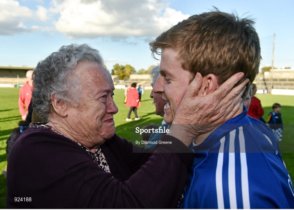12 October 2014; Cratloe's Padraic Collins is congratulated by his grandmother Annette Collins after victory over Eire Og. Clare County Senior Football Championship Final, Cratloe v Eire Og. Cusack Park, Ennis, Co. Clare. Picture credit: Diarmuid Greene / SPORTSFILE
