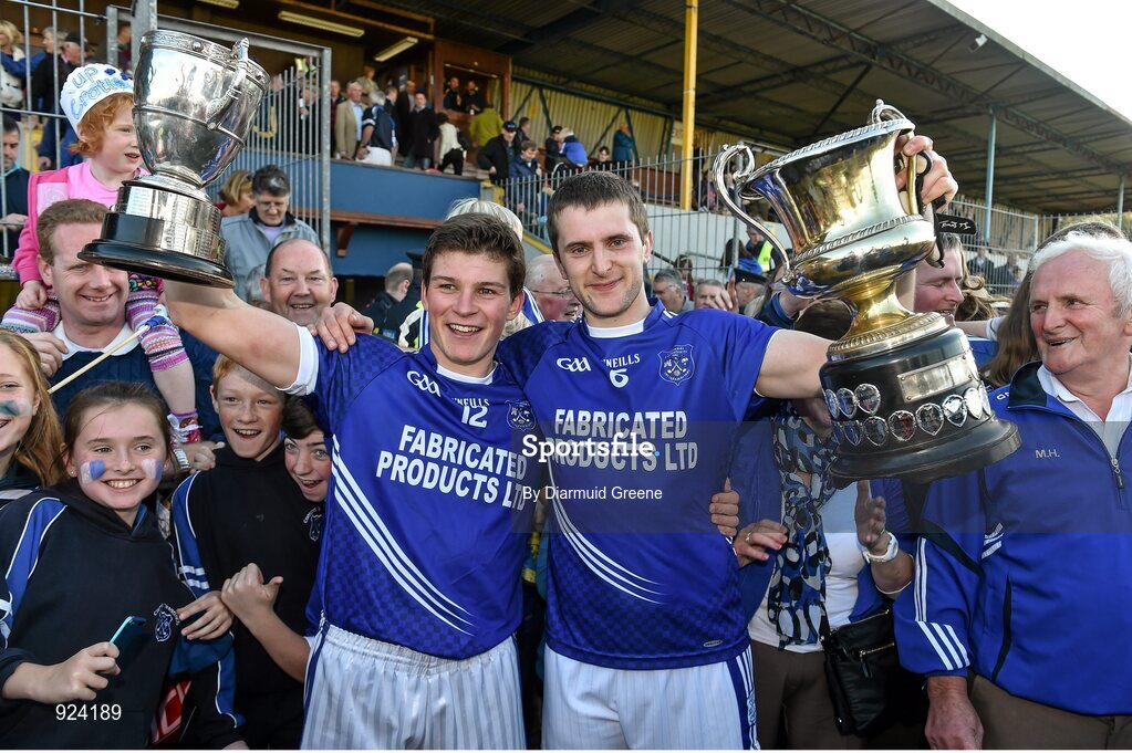 12 October 2014; Cratloe Double County Champions captains, Liam Markham, hurling, left, and football captain Michael Hawes celebrate with their cups. Clare County Senior Football Championship Final, Cratloe v Eire Og. Cusack Park, Ennis, Co. Clare. Picture credit: Diarmuid Greene / SPORTSFILE