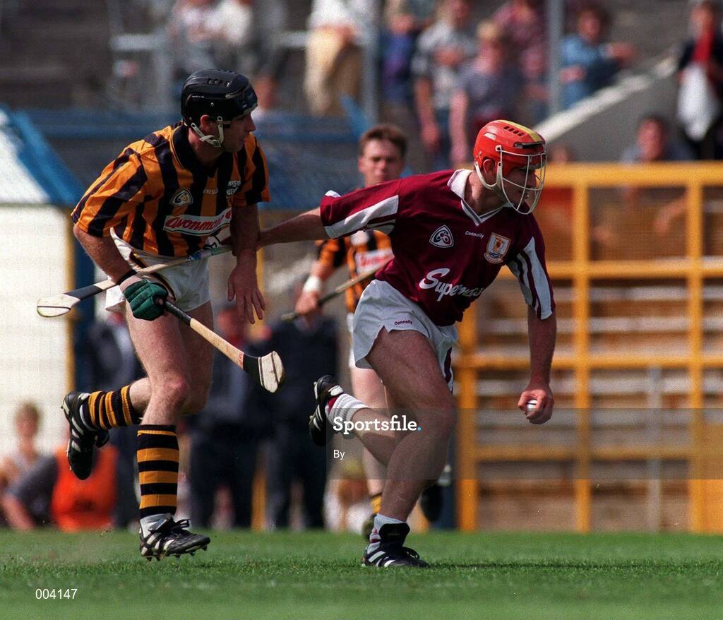 27 July 1997; Nigel Shaughnessy, Galway, gets away from Kilkenny's DJ Carey. Kilkenny v Galway, All Ireland Hurling Quarter Final, Semple Stadium, Thurles, Co. Tipperary. Picture credit; Ray McManus / SPORTSFILE