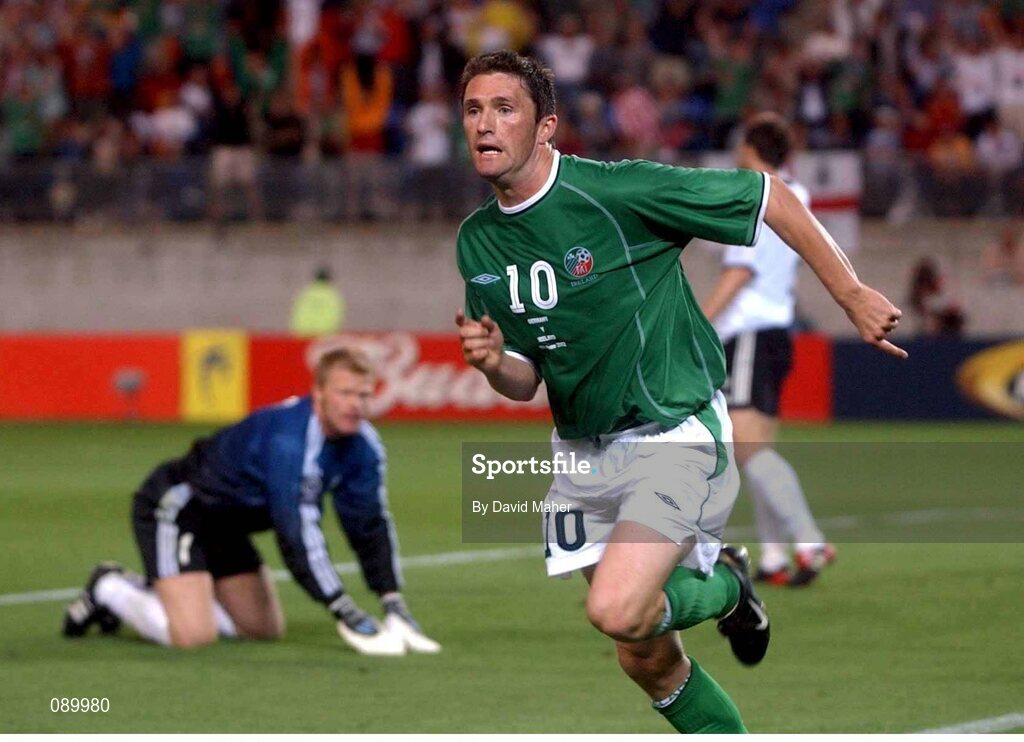 5 June 2002; Robbie Keane, Republic of Ireland, celebrates his goal as Germany goalkeeper Oliver Kahn looks on. FIFA World Cup Finals, Group E, Republic of Ireland v Germany, Ibaraki Stadium, Ibaraki, Japan. Picture credit: David Maher / SPORTSFILE