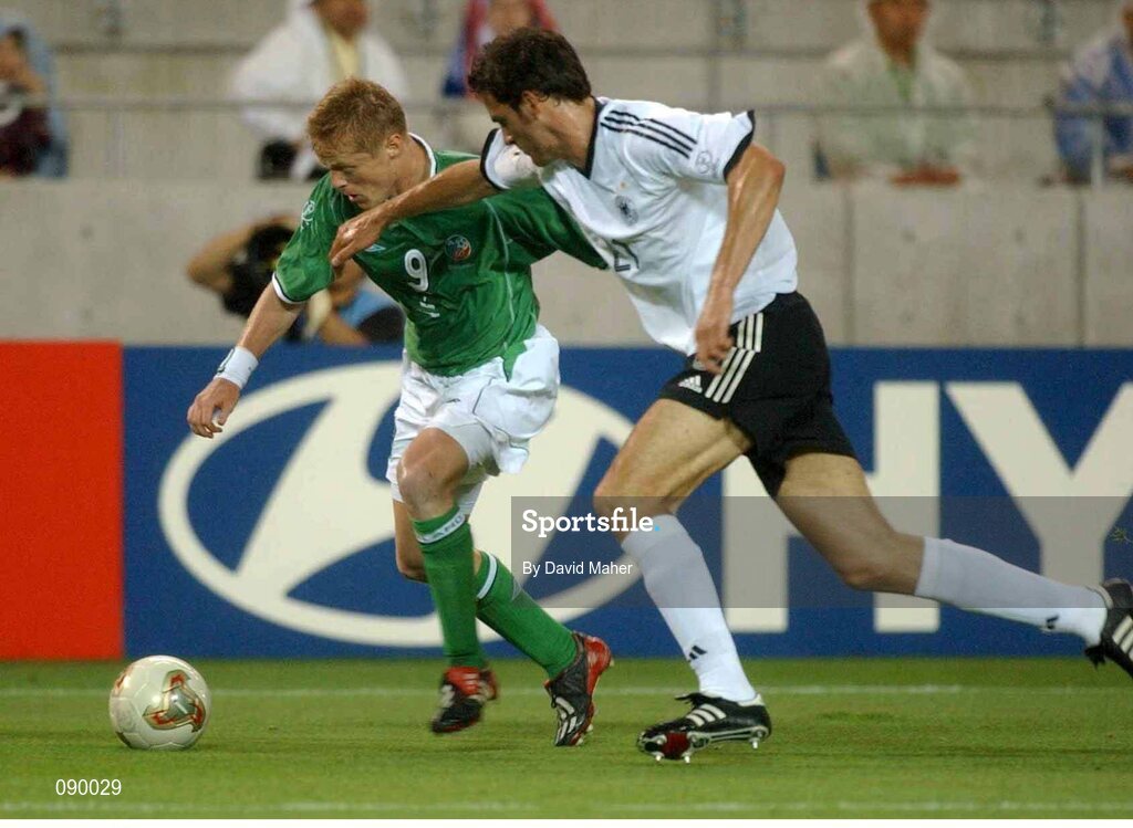 5 June 2002; Damien Duff, Republic of Ireland, is tackled by Christophe Metzelder, Germany. FIFA World Cup Finals, Group E, Republic of Ireland v Germany, Ibaraki Stadium, Ibaraki, Japan. Picture credit: David Maher / SPORTSFILE