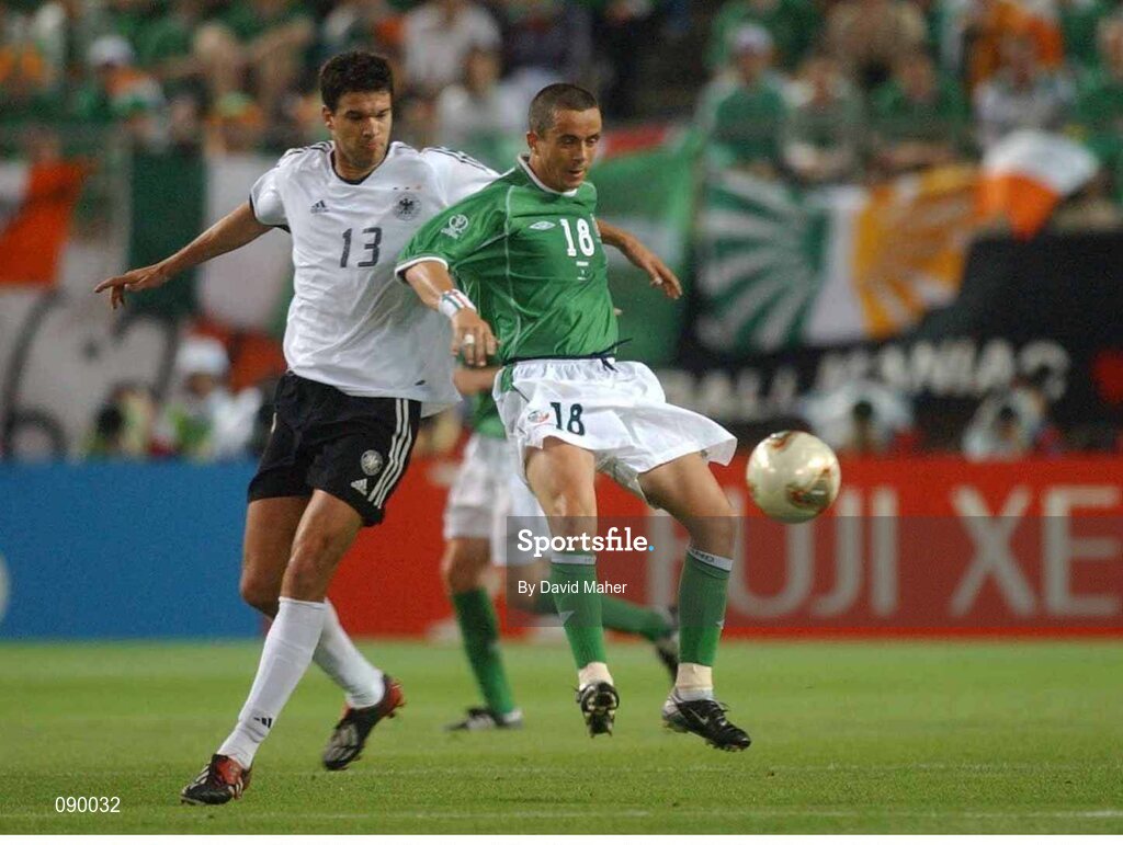 5 June 2002; Gary Kelly, Republic of Ireland, is tackled by Michael Ballack, Germany. FIFA World Cup Finals, Group E, Republic of Ireland v Germany, Ibaraki Stadium, Ibaraki, Japan. Picture credit: David Maher / SPORTSFILE