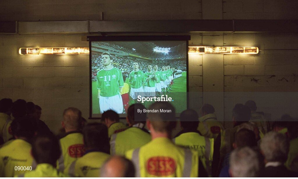 5 June 2002; Building workers employed on the construction of the new stand at Croke Park watch a live broadcast of the Republic of Ireland v Germany game at the FIFA World Cup Finals. Picture credit: Brendan Moran / SPORTSFILE