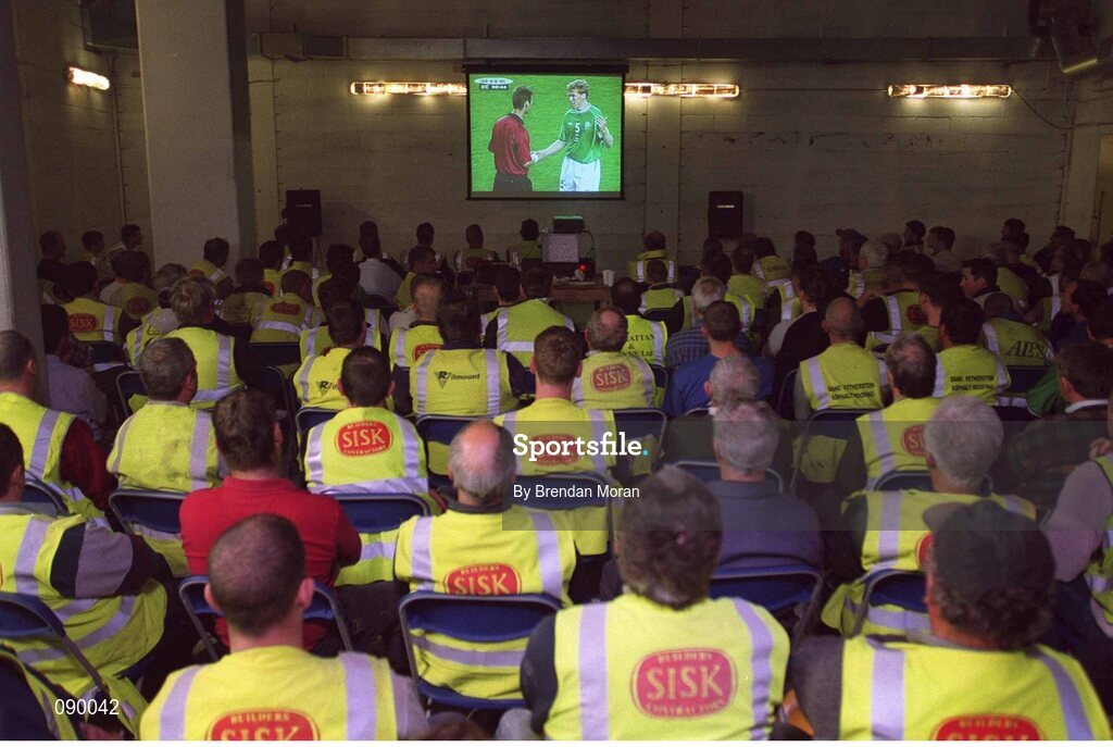 5 June 2002; Building workers employed in the construction of the new stand at Croke Park watch a live broadcast of the Republic of Ireland v Germany game at the FIFA World Cup Finals. Picture credit: Brendan Moran / SPORTSFILE