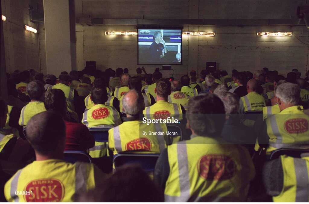 5 June 2002; Building workers employed in the construction of the new stand at Croke Park watch a live broadcast of the Republic of Ireland v Germany game at the FIFA World Cup Finals. Picture credit: Brendan Moran / SPORTSFILE
