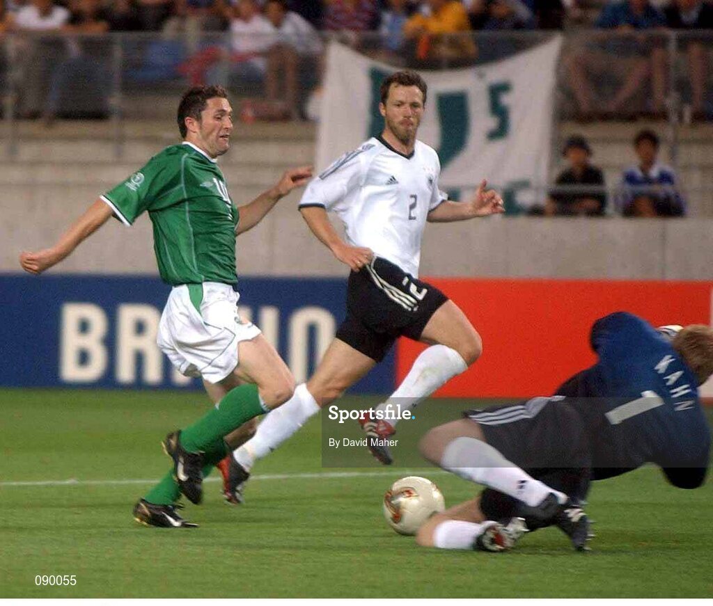 5 June 2002; Robbie Keane, Republic of Ireland, has his shot saved by Germany goalkeeper Oliver Khan. FIFA World Cup Finals, Group E, Republic of Ireland v Germany, Ibaraki Stadium, Ibaraki, Japan. Picture credit: David Maher / SPORTSFILE