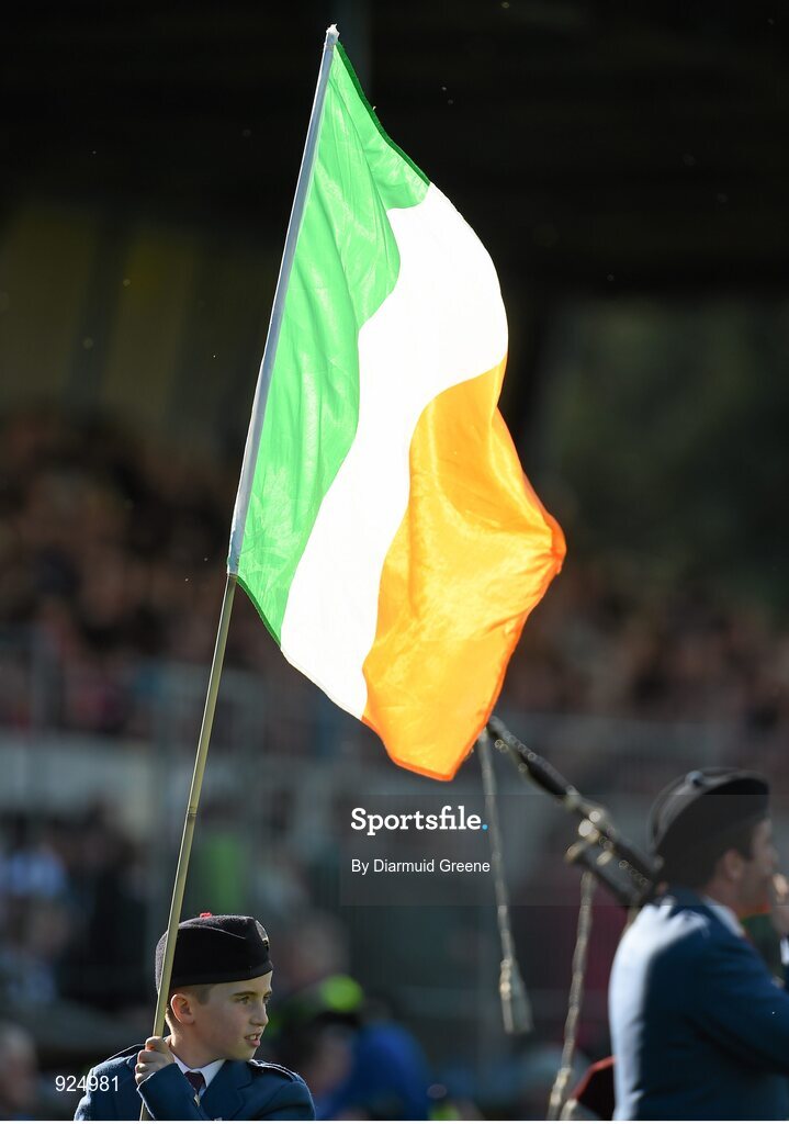 12 October 2014; Daragh Leamy, aged 10, from Tulla, Co. Clare, flagbearer for the Tulla Pipe Band, before the game. Clare County Senior Football Championship Final, Cratloe v Eire Og. Cusack Park, Ennis, Co. Clare. Picture credit: Diarmuid Greene / SPORTSFILE