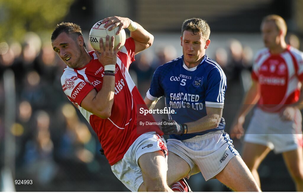 12 October 2014; Graham Glynn, Eire Og, in action against Martin Oige Murphy, Cratloe. Clare County Senior Football Championship Final, Cratloe v Eire Og. Cusack Park, Ennis, Co. Clare. Picture credit: Diarmuid Greene / SPORTSFILE