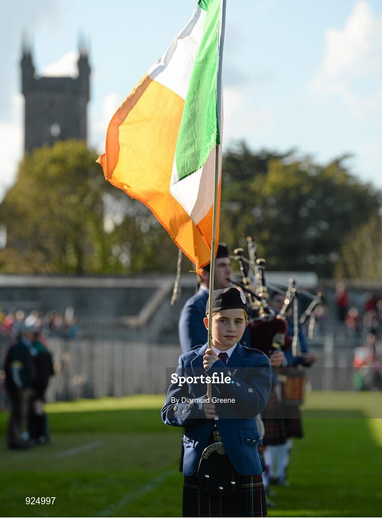 12 October 2014; Daragh Leamy, aged 10, from Tulla, Co. Clare, flagbearer for the Tulla Pipe Band, before the game. Clare County Senior Football Championship Final, Cratloe v Eire Og. Cusack Park, Ennis, Co. Clare. Picture credit: Diarmuid Greene / SPORTSFILE
