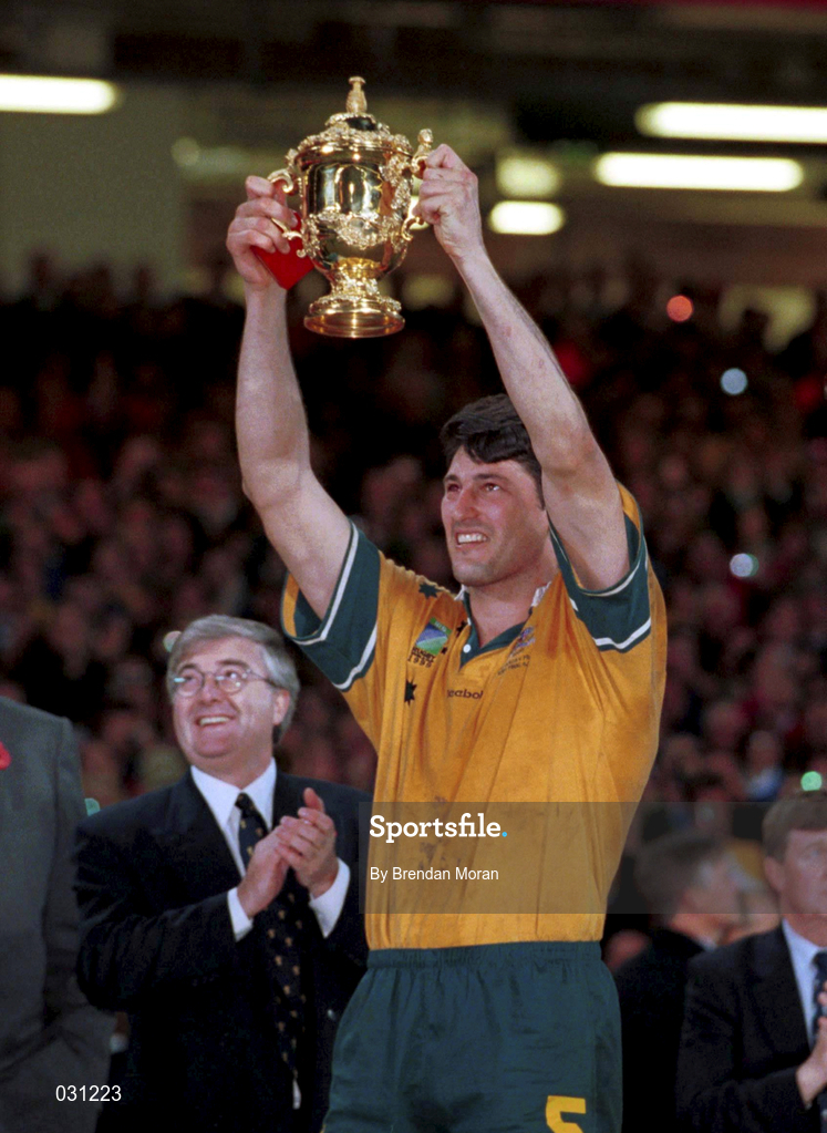 6 November 1999; Australia captain John Eales lifts the Webb Ellis Cup following the Rugby World Cup Final match between Australia and France at the Millenium Stadium in Cardiff, Wales. Photo by Brendan Moran/Sportsfile