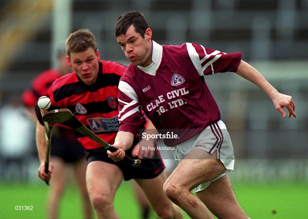 28 November 1999; Greg Baker of St. Joseph's Doora-Barefield in action against Niall O'Donnell of Ballygunner during the AIB Munster Senior Club Hurling Championship Final match between Ballygunner and St. Joseph's Doora-Barefield at Semple Stadium in Thurles, Tipperary. Photo by Ray McManus/Sportsfile