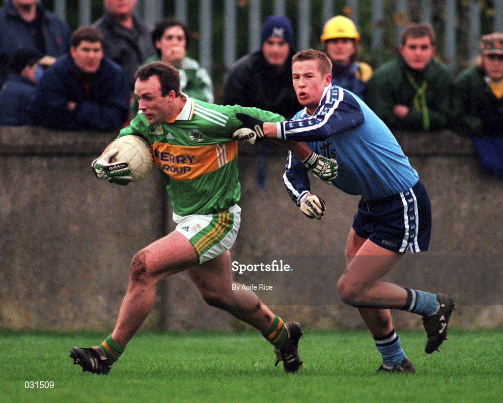 28 November 1999; John Crowley of Kerry in action against Declan Conlon of Dublin during the Church & General National Football League match between Dublin and Kerry at Parnell Park in Dublin. Photo by Aoife Rice/Sportsfile