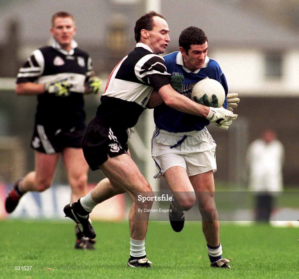 7 November 1999; John Lynch of Laune Rangers in action against Francis McInerney of Doonbeg during the AIB Munster Senior Club Football Championship semi-final match between Doonbeg and Laune Rangers at Fitzgerald Stadium in Killarney, Kerry. Photo by Damien Eagers/Sportsfile