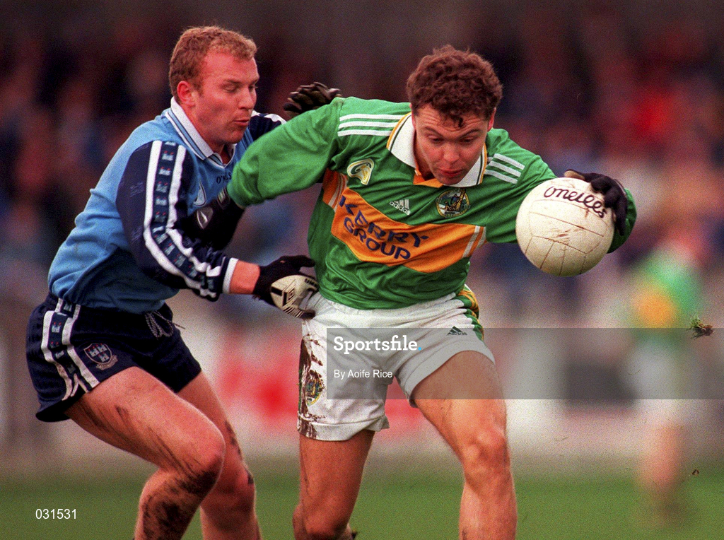 28 November 1999; John McGlynn of Kerry is tackled by Shane Ryan of Dublin during the Church & General National Football League match between Dublin and Kerry at Parnell Park in Dublin. Photo by Aoife Rice/Sportsfile