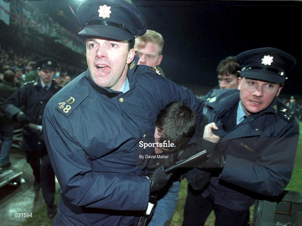15 Feburary 1995; An England supporter is restrained by Gardai after rioting in the West Stand forced the abandonment of the international friendly match between Republic of Ireland and England at Lansdowne Road in Dublin. Photo by David Maher/Sportsfile
