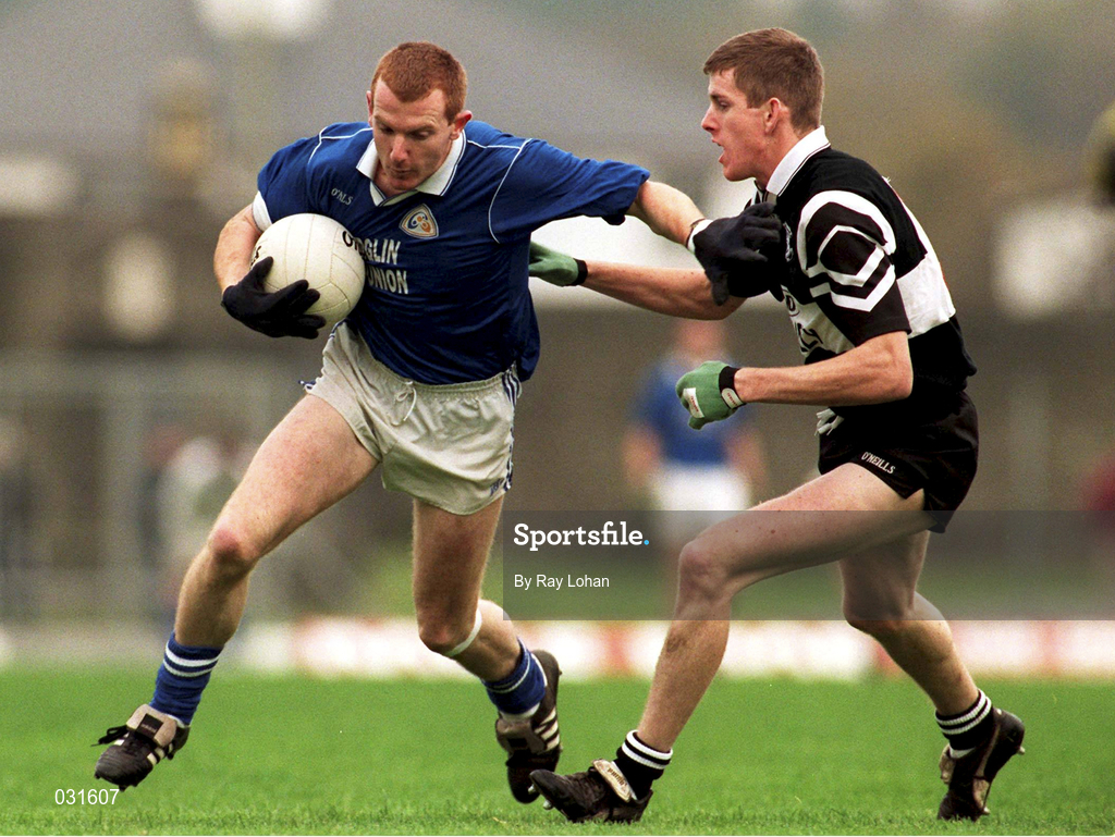 7 November 1999; Liam Hassett of Laune Rangers in action against Conor Whelan of Doonbeg during the AIB Munster Senior Club Football Championship semi-final match between Doonbeg and Laune Rangers at Fitzgerald Stadium in Killarney, Kerry. Photo by Ray Lohan/Sportsfile