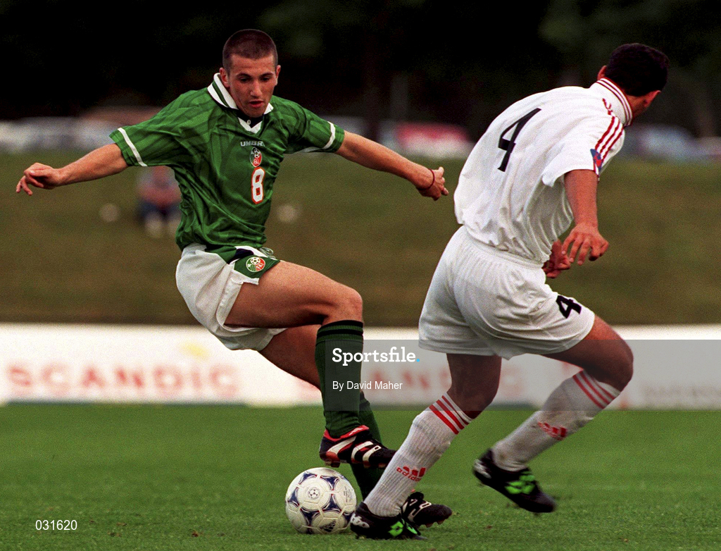 21 July 1999; Liam Miller of Republic of Ireland in action against Ediki Sajaia of Georgiaduring the Under 18 Championship Group B Round 2 between Georgia and Republic of Ireland at the Folkungavallen Stadium in Linköping, Sweden. Photo by David Maher/Sportsfile