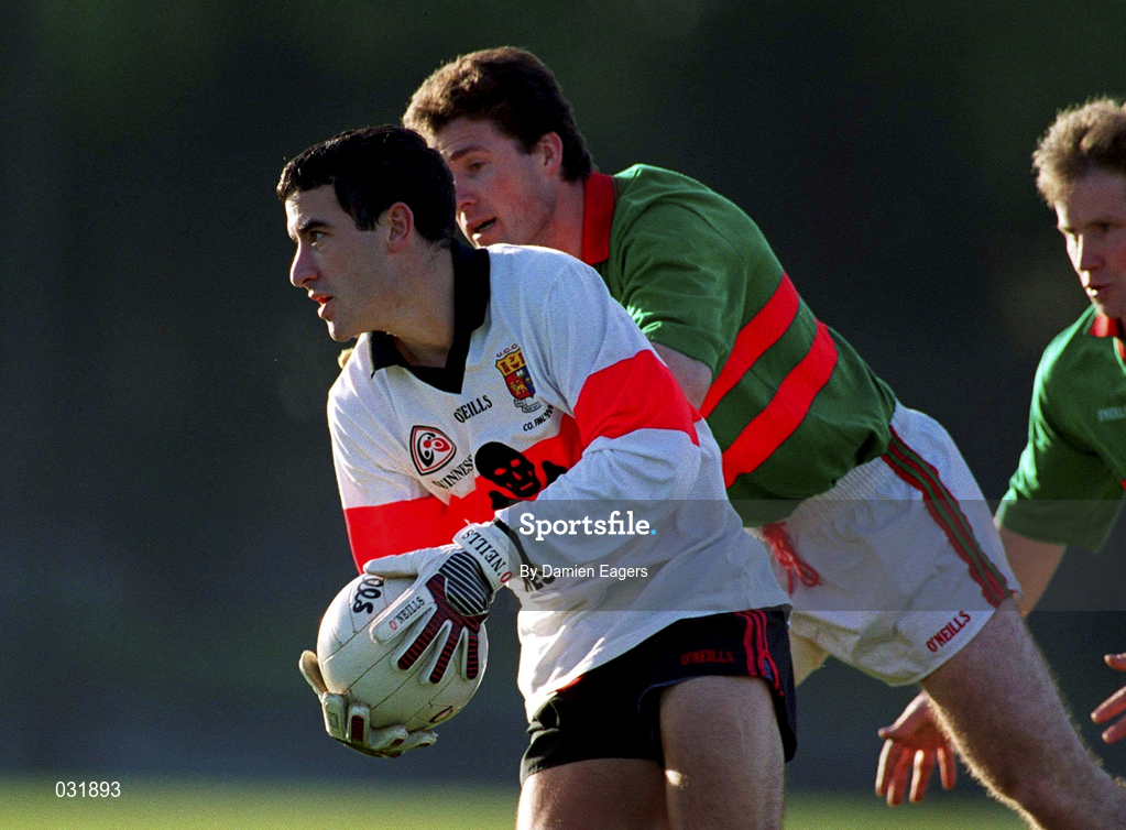 20 November 1999; Seamus Downey of UCC in action against Joe Murray of Rathgormac during the AIB Munster Senior Club Football Championship semi-final match between Rathgormack and UCC at Páirc Uí Rinn in Cork. Photo by Damien Eagers/Sportsfile