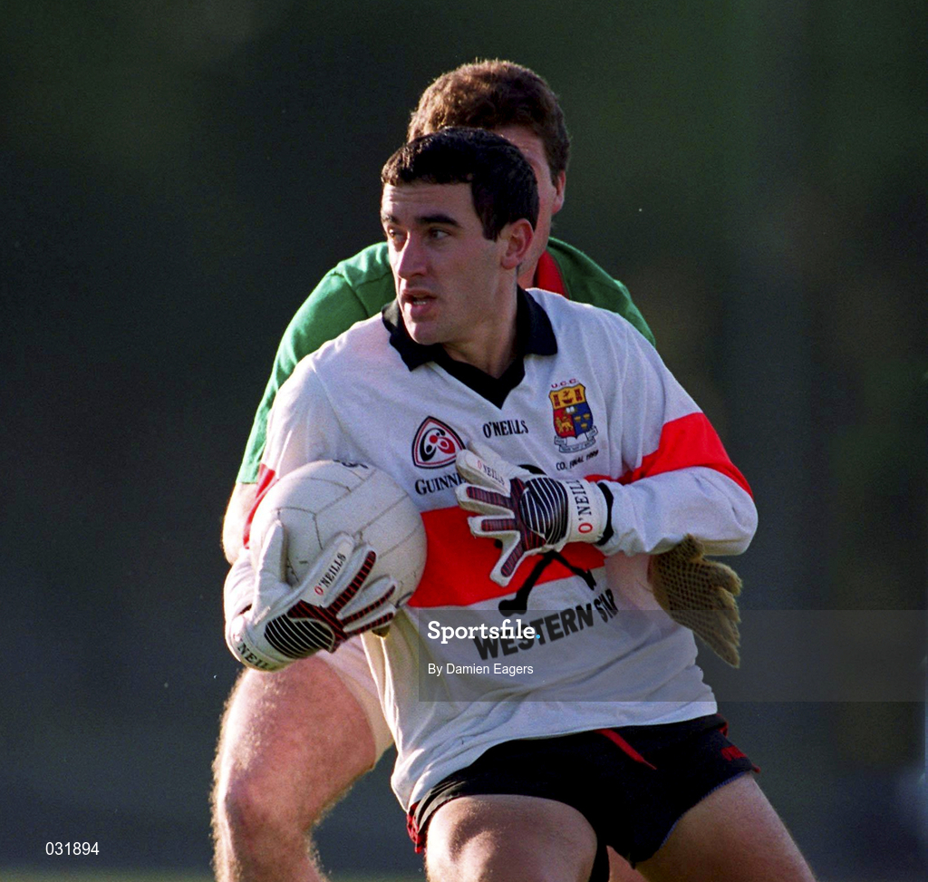 20 November 1999; Seamus Downey of UCC in action against Joe Murray of Rathgormac during the AIB Munster Senior Club Football Championship semi-final match between Rathgormack and UCC at Páirc Uí Rinn in Cork. Photo by Damien Eagers/Sportsfile