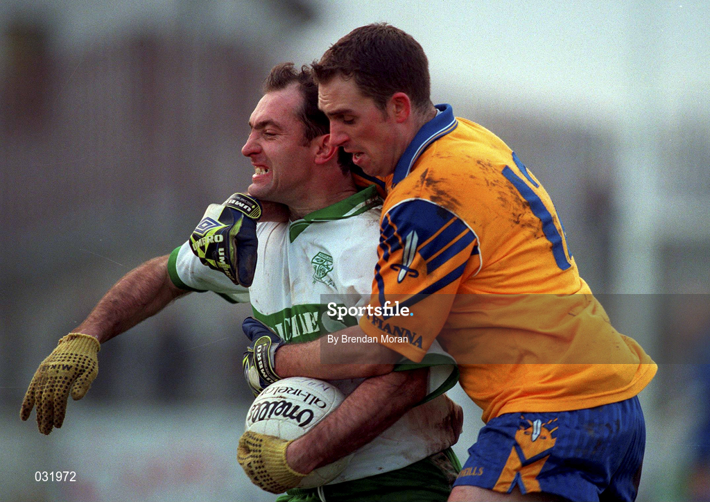 21 November 1999; Thomas Conroy of Portlaoise is tackled by Karl Donnelly of Na Fianna during the AIB Leinster Senior Club Football Championship Semi-Final match Na Fianna and Portlaoise at St Conleth's Park in Newbridge, Kildare. Photo by Brendan Moran/Sportsfile