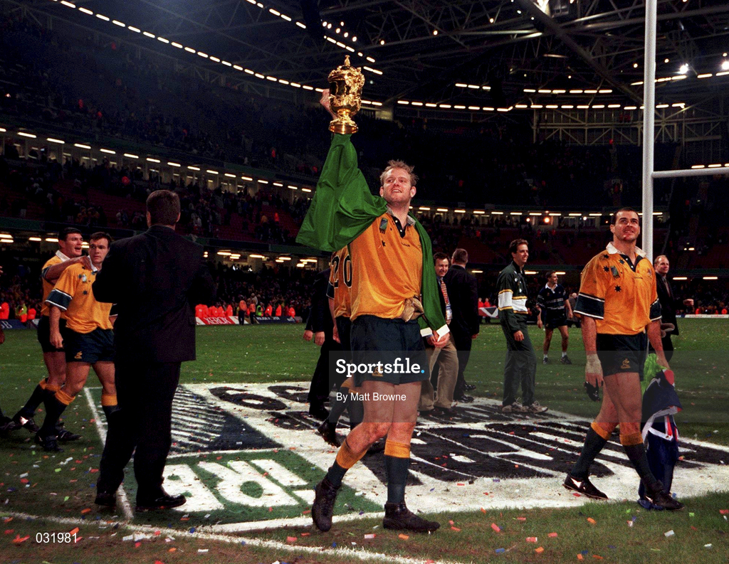 6 November 1999; Tom Bowman of Australia with the Webb Ellis Cup following the Rugby World Cup Final match between Australia and France at the Millenium Stadium in Cardiff, Wales. Photo by Matt Browne/Sportsfile