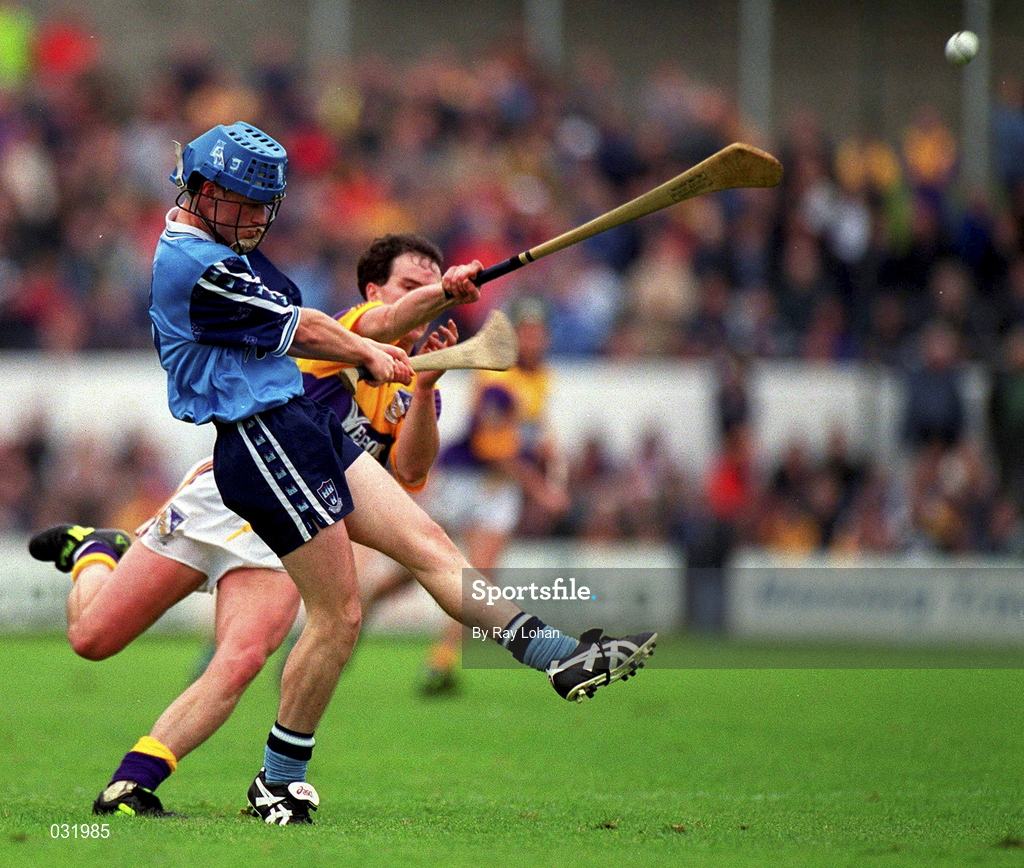 30 May 1999; Tomás McGrane of Dublin in action against Adrian Fenlon of Wexford during the Guinness Leinster Senior Hurling Championship Quarter-Final match between Dublin and Wexford at Nowlan Park in Kilkenny. Photo by Ray Lohan/Sportsfile