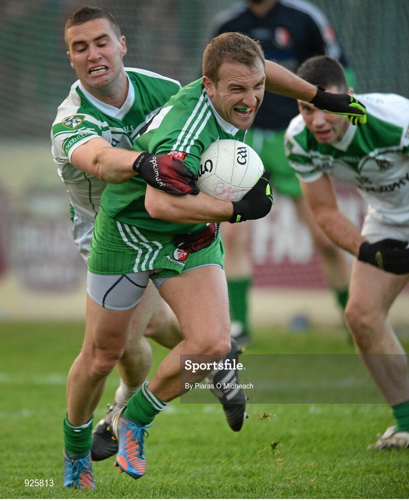 19 October 2014; Michael Browne, Sarsfields, in action against Eddie Heavey, Moorefield. Kildare County Senior Football Championship Final, Sarsfields v Moorefield, St Conleth's Park, Newbridge, Co. Kildare. Picture credit: Piaras Ó Mídheach / SPORTSFILE