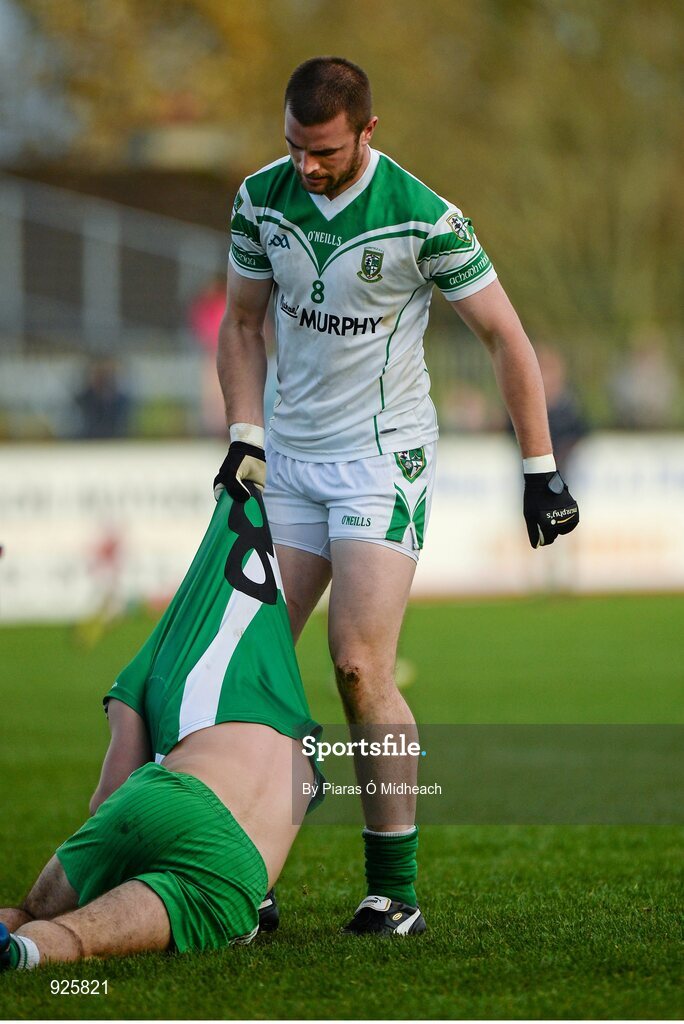 19 October 2014; Daryl Flynn, Moorefield, pulls Matty Byrne, Sarsfields, from the ground by the jersey. Kildare County Senior Football Championship Final, Sarsfields v Moorefield, St Conleth's Park, Newbridge, Co. Kildare. Picture credit: Piaras Ó Mídheach / SPORTSFILE