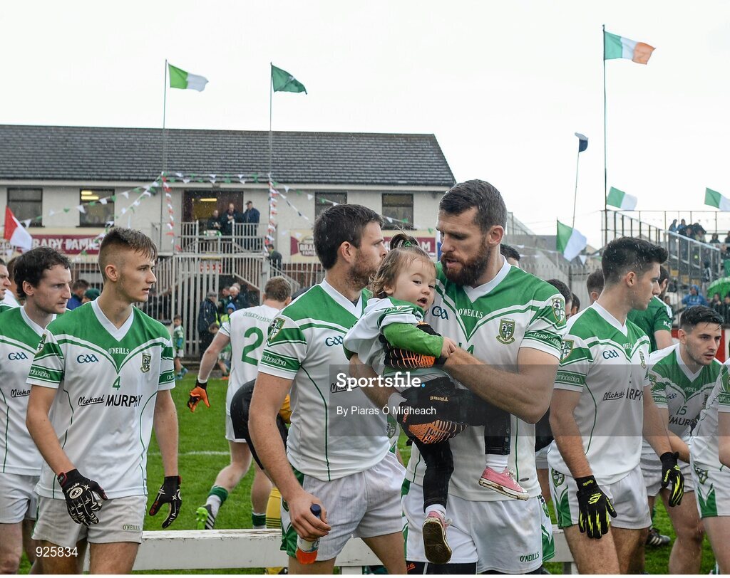 19 October 2014; Moorefield captain Ronan Sweeney with his 18 month old daughter Summer after the pre-match team photograph. Kildare County Senior Football Championship Final, Sarsfields v Moorefield, St Conleth's Park, Newbridge, Co. Kildare. Picture credit: Piaras Ó Mídheach / SPORTSFILE
