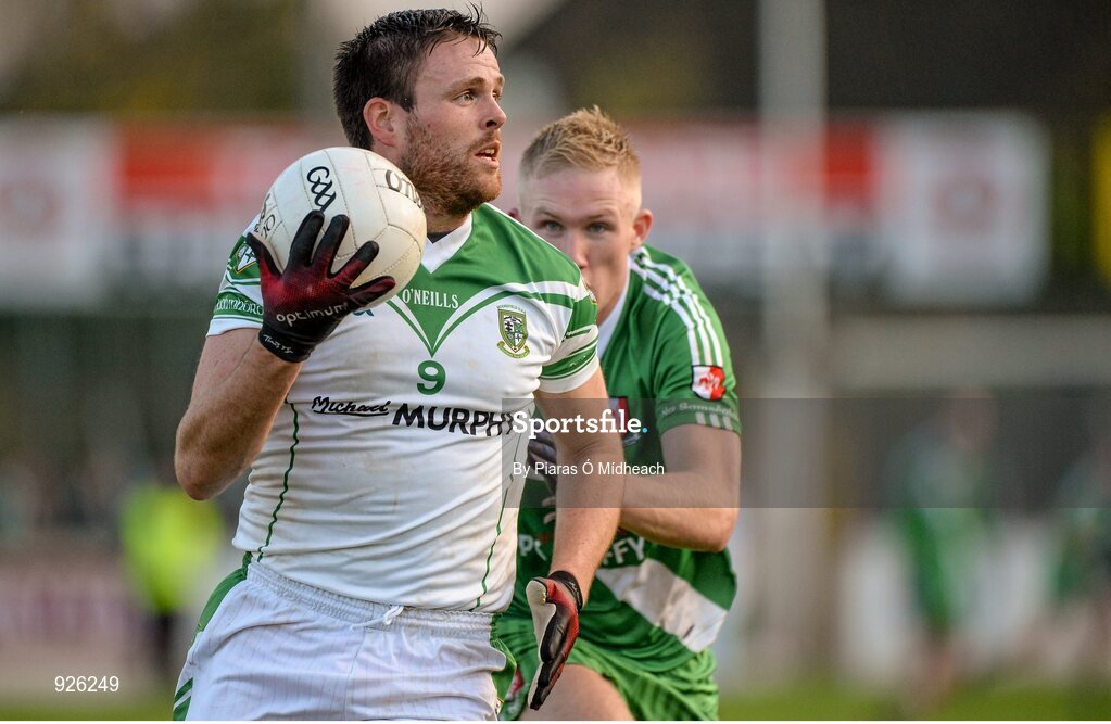 19 October 2014; Cian O'Connor, Moorefield, in action against Ray Cahill, Sarsfields. Kildare County Senior Football Championship Final, Sarsfields v Moorefield, St Conleth's Park, Newbridge, Co. Kildare. Picture credit: Piaras Ó Mídheach / SPORTSFILE