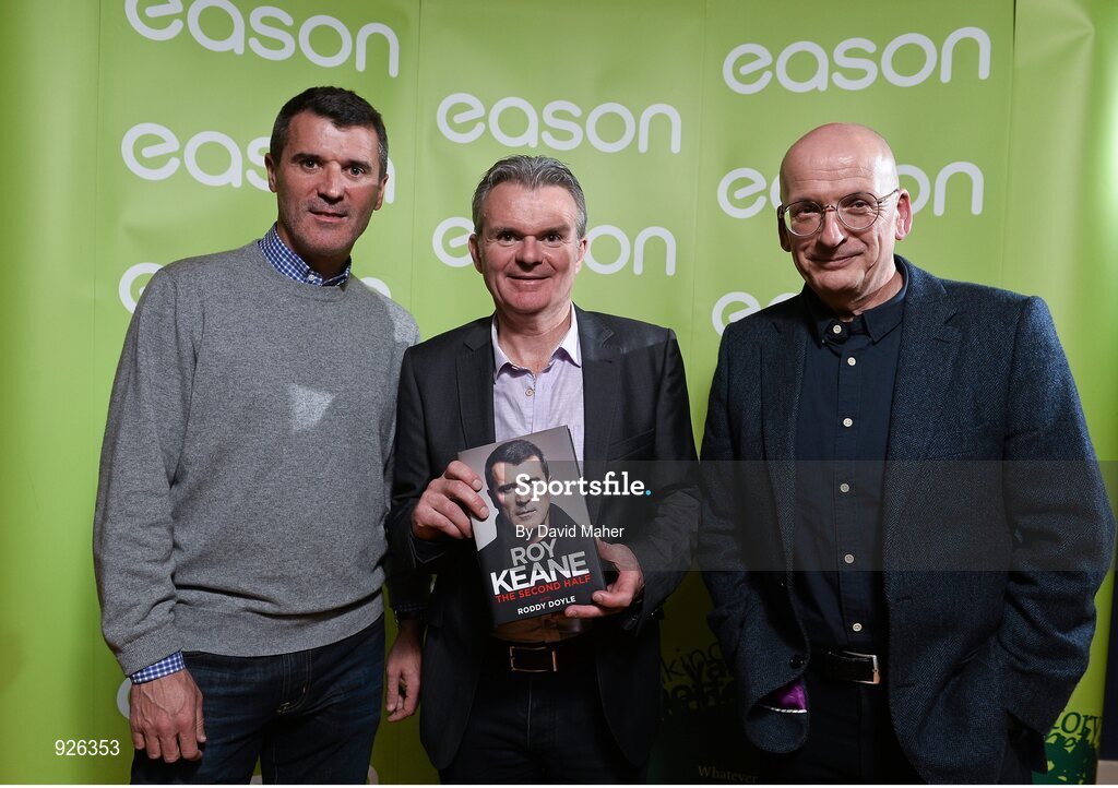 22 October 2014; Pictured is legendary former professional football player and current Republic of Ireland assistant manager Roy Keane who marked the launch of his new book 'The Second Half' at an exclusive Eason event in the RDS. Joined on stage with co-author of the book, Roddy Doyle, Keane treated fans to some great insights into his life and achievements. Keane’s book, The Second Half, is currently on sale in Eason stores nationwide and online at www.easons.com. Pictured with Roy Keane and co-author Roddy Doyle is Eason Managing Director Conor Whelan. RDS, Ballsbridge, Dublin. Picture credit: David Maher / SPORTSFILE