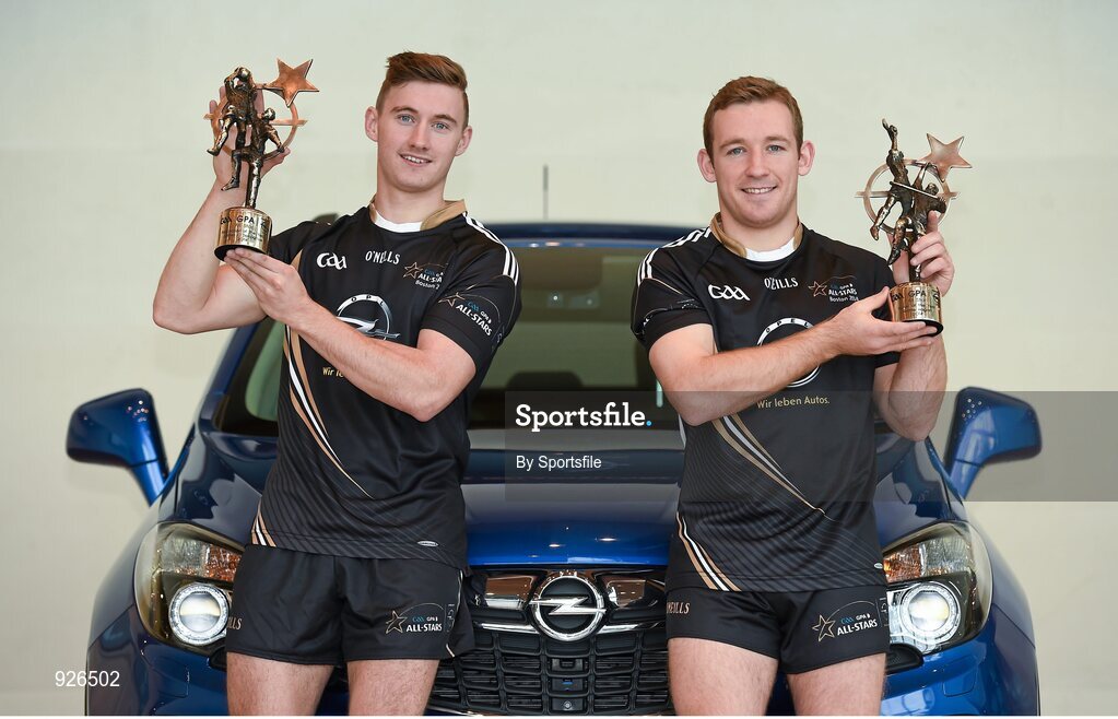 24 October 2014; Kerry footballer James O'Donoghue, left, and Kilkenny hurler Richie Hogan, right, with their 2014 GAA GPA All-Star Player of the Year awards. Convention Centre, Dublin. Photo by Sportsfile