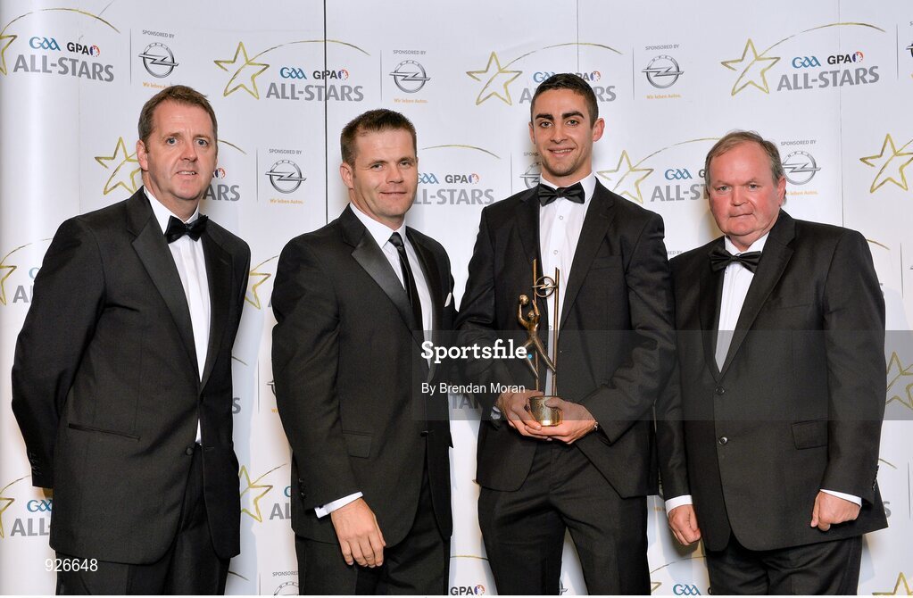 24 October 2014; Dublin footballer James McCarthy is presented with his 2014 GAA GPA All-Star award by Uachtarán Chumann Lúthchleas Gael Liam Ó Néill, Dessie Farrell, Chief Executive of the Gaelic Players Association, and Dave Sheeran, Managing Director of Opel Ireland. GAA GPA All-Star Awards 2014 Sponsored by Opel. Convention Centre, Dublin. Picture credit: Brendan Moran / SPORTSFILE