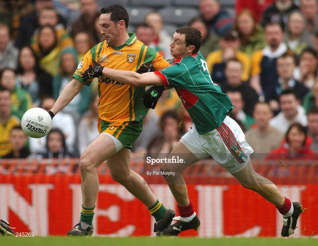22 April 2007; Brendan Devnney, Donegal, in action against Keith Higgins, Mayo. Allianz National Football League, Division 1 Final, Mayo v Donegal, Croke Park, Dublin. Picture credit: Pat Murphy / SPORTSFILE