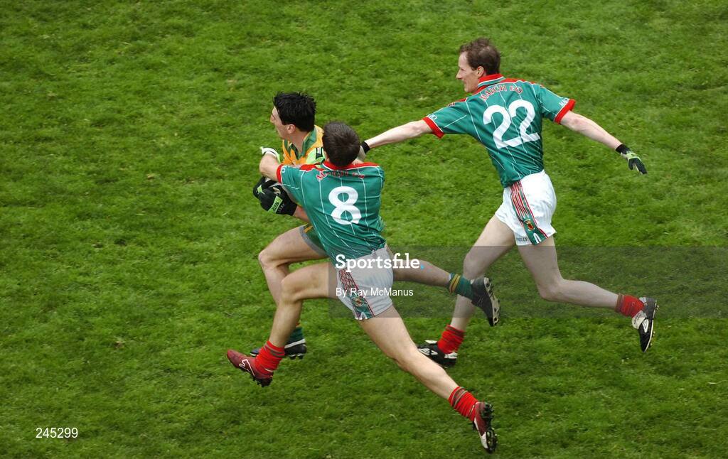 22 April 2007; Michael Hegarty, Donegal, is tackled by Pat Harte and James Nallen, Mayo. Allianz National Football League, Division 1, Final, Mayo v Donegal, Croke Park, Co. Dublin. Picture credit: Ray McManus / SPORTSFILE