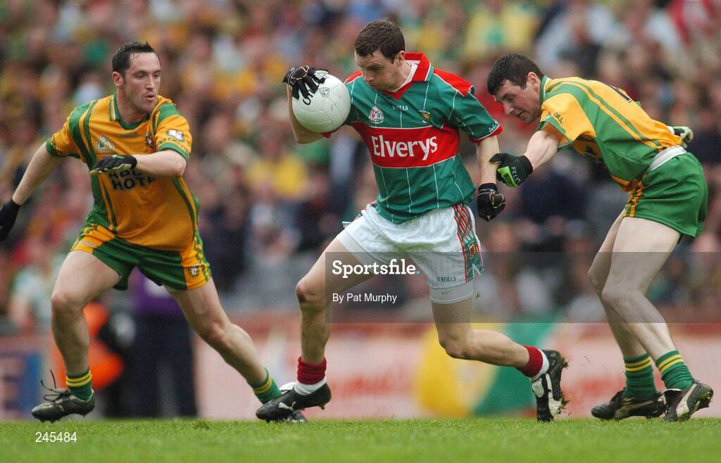 22 April 2007; Keith Higgins, Mayo, in action against Brendan Devenney, left, and Ciaran Bonner, Mayo. Allianz National Football League, Division 1 Final, Mayo v Donegal, Croke Park, Dublin. Picture credit: Pat Murphy / SPORTSFILE