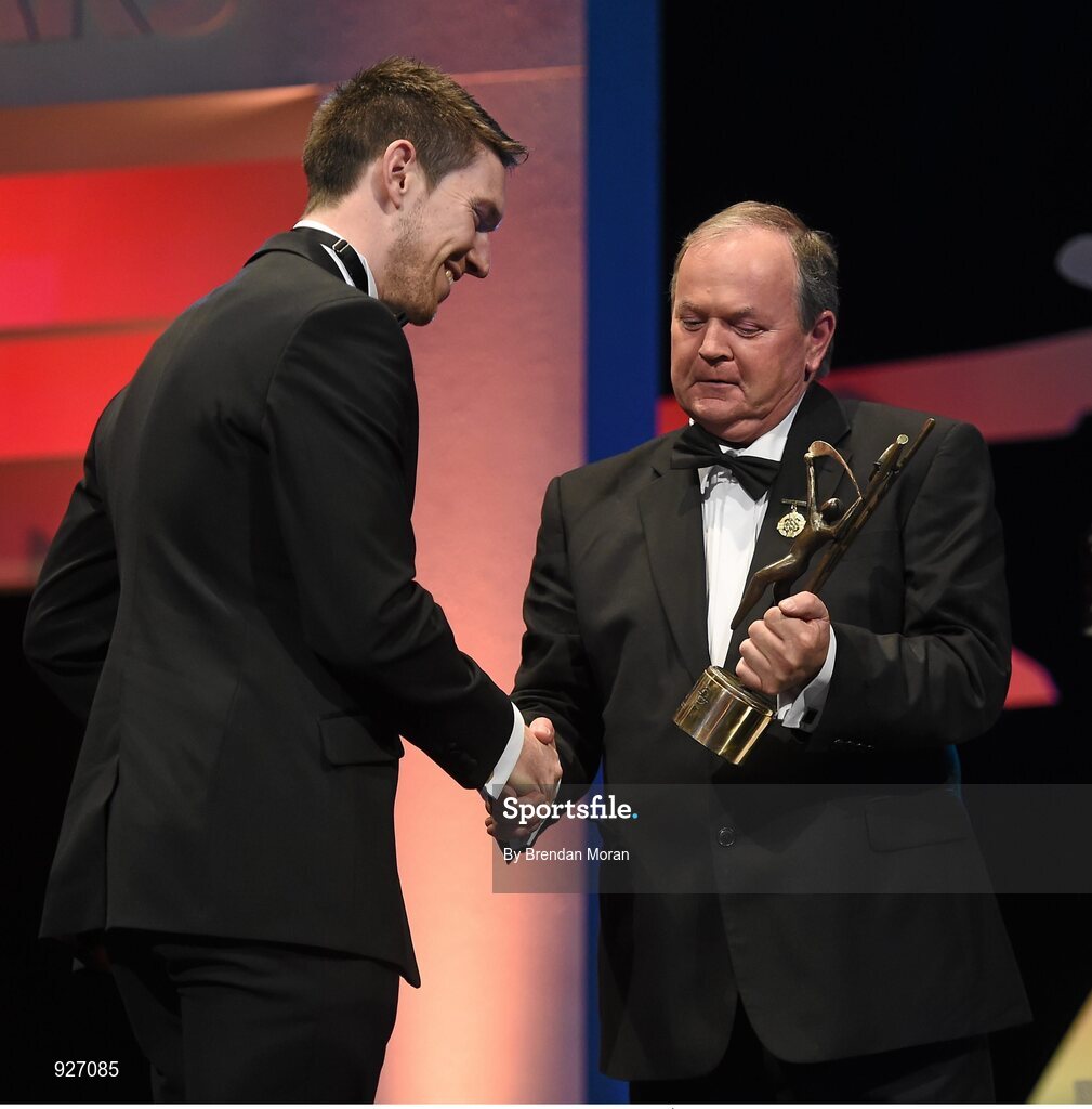 24 October 2014; Seamus Hickey, Limerick, is presented with his All-Star award by Uachtarán Chumann Lúthchleas Gael Liam Ó Néill and Donal Og Cusack, right, Chairman, GPA, during the 2014 GAA GPA All-Star Awards, sponsored by Opel. Convention Centre, Dublin. Picture credit: Brendan Moran / SPORTSFILE