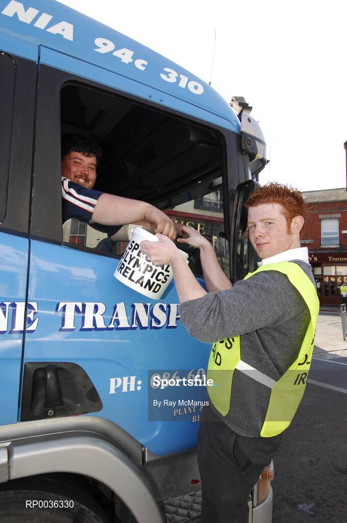 27 April 2007; Terenure College transition year student Rob Lynam collects a donation from truck driver Ger Kane, from Summerhill, Co. Meath, at Rathfarnham Road, Terenure, during the Special Olympics "Road to China" Collection Day, the aim of which is to provide more opportunities for people with a learning difficulty in their own communities and to help prepare Team Ireland for the 2007 World Games in China in October. Picture credit: Ray McManus / SPORTSFILE