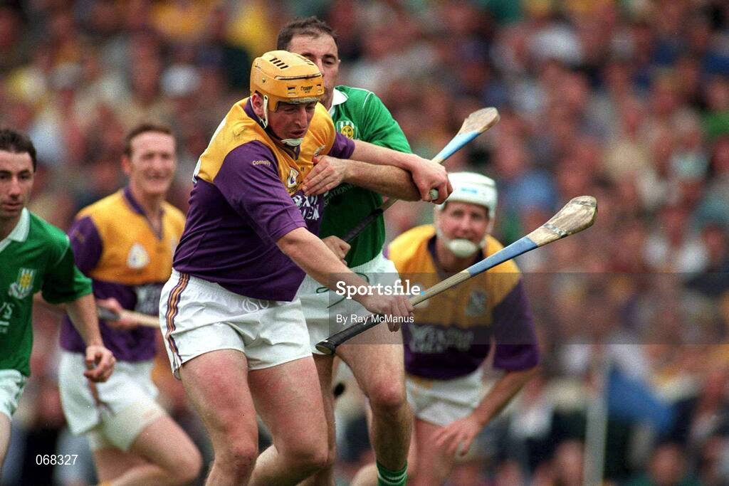 1 September 1996; Gary Laffan, Wexford, in action against Mike Nash, Limerick, Wexford v Limerick, All Ireland Hurling Final, Croke Park, Dublin. Picture credit; Ray McManus / SPORTSFILE