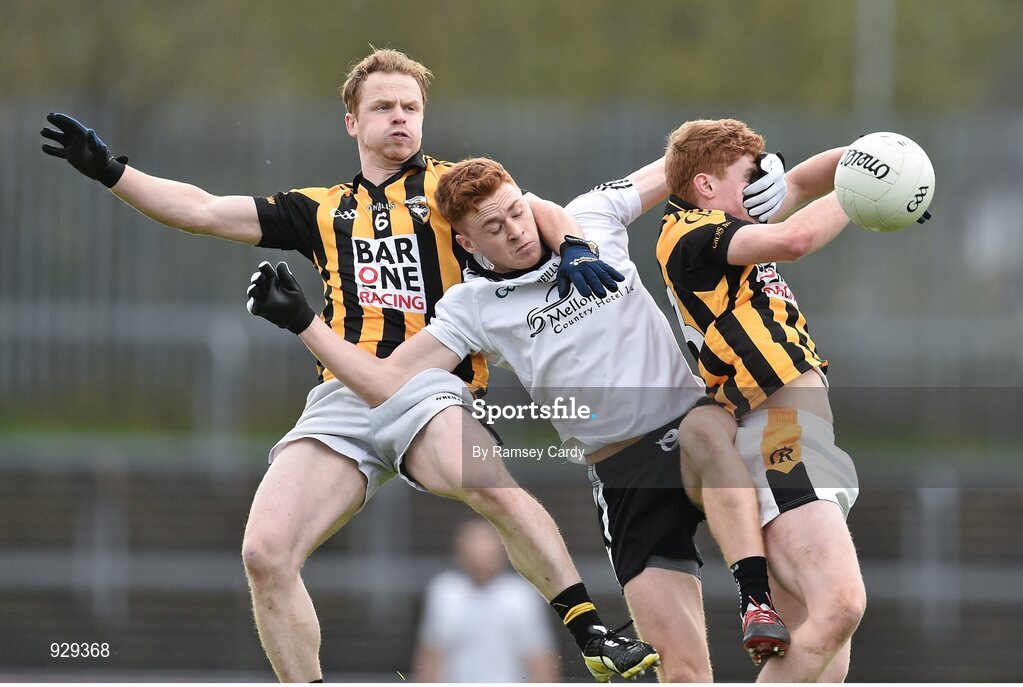 2 November 2014; Conor Meyler, Omagh St Enda’s, in action against Paul McKeown, left, and Padraig Studdard, Crossmaglen Rangers. AIB Ulster GAA Football Senior Club Championship, Quarter-Final, Omagh St Enda’s v Crossmaglen Rangers, Healy Park, Omagh, Co. Tyrone. Picture credit: Ramsey Cardy / SPORTSFILE