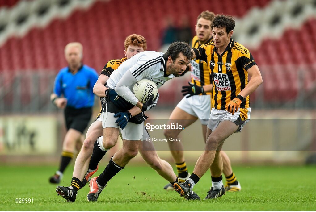 2 November 2014; Joseph McMahon, Omagh St Enda’s, in action against Padraig Studdard, left, and Jamie Clarke, Crossmaglen Rangers. AIB Ulster GAA Football Senior Club Championship, Quarter-Final, Omagh St Enda’s v Crossmaglen Rangers, Healy Park, Omagh, Co. Tyrone. Picture credit: Ramsey Cardy / SPORTSFILE