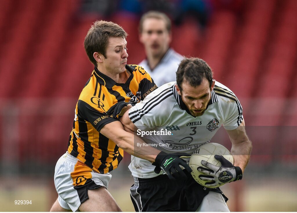 2 November 2014; Justin McMahon, Omagh St Enda’s, in action against Kyle Brennan, Crossmaglen Rangers. AIB Ulster GAA Football Senior Club Championship, Quarter-Final, Omagh St Enda’s v Crossmaglen Rangers, Healy Park, Omagh, Co. Tyrone. Picture credit: Ramsey Cardy / SPORTSFILE