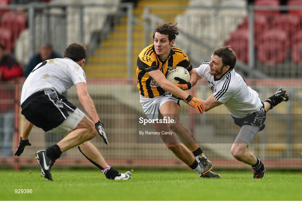 2 November 2014; Jamie Clarke, Crossmaglen Rangers, in action against Justin McMahon, left, and Barry Tierney, Omagh St Enda’s. AIB Ulster GAA Football Senior Club Championship, Quarter-Final, Omagh St Enda’s v Crossmaglen Rangers, Healy Park, Omagh, Co. Tyrone. Picture credit: Ramsey Cardy / SPORTSFILE