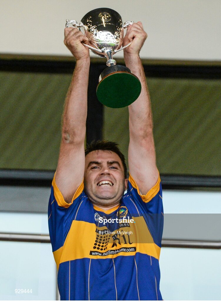 2 November 2014; Portaferry Captain John Convery holds aloft the Ulster Club Hurling cup. AIB Ulster GAA Hurling Senior Club Championship Final, Portaferry v Cushendall  Ruairi Óg, Owenbeg Centre of Excellence, Dungiven, Derry. Picture credit: Oliver McVeigh / SPORTSFILE